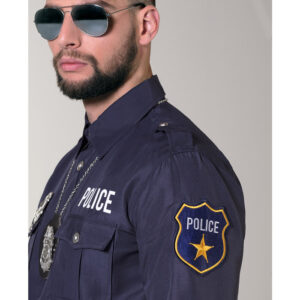 Chemise de police en tissu, avec détails typiques de la police. Accessoire de déguisement idéal pour une soirée à thème police, un carnaval ou Halloween.