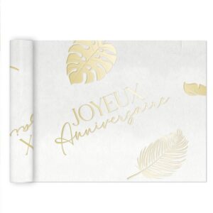 chemin de table blanc de 4 m se compose d'u motif de feuilles tropicales dorées ainsi que de la mention Joyeux Anniversaire