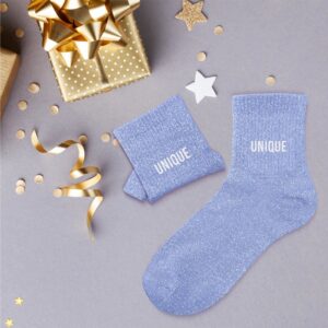 CHAUSSETTES PAILLETTES UNIQUE. A la recherche d'une paire de chaussettes originale qui tient au chaud ? Notre paire de chaussettes à paillettes "Unique" est l'accessoire Mode idéal ! Taille : 36-42