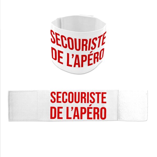 BRASSARD APERO SECOURISTE DE L'APERO. Pour garder un souvenir impérissable d'une soirée endiablée, optez pour notre brassard apéro ""Secouriste de l'Apéro"" ! Ce brassard blanc comporte la mention ""Secouriste de l'Apéro"" en rouge et est facilement ajustable à tous les tours de bras grâce à son scratch. *L'abus d'alcool est dangereux pour la santé, à consommer avec modération*