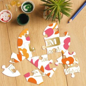 Offrez un message touchant et mémorable avec notre puzzle affectif "ATSEM". Composé de 12 pièces formant un cœur blanc, il dévoile la mention dorée "ATSEM merci pour tout !" une fois assemblé. Idéal pour remercier une ATSEM exceptionnelle, ce cadeau original peut être personnalisé au dos et est livré avec une enveloppe. Immense sourire aux lèvres garanti !