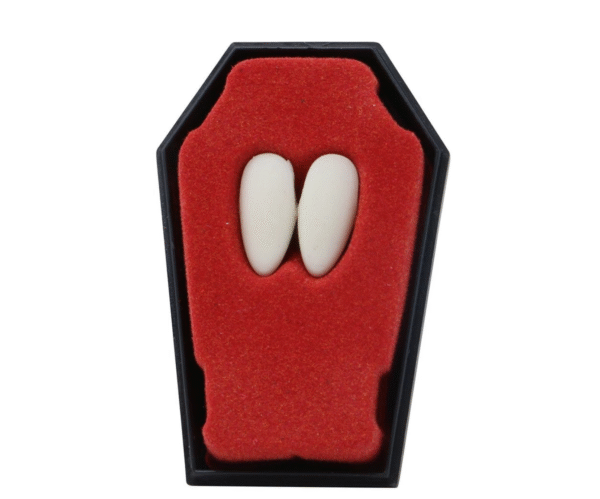 Mettez des frissons sur votre sourire avec nos Dents de Vampire ! Un accessoire de déguisement classique, facile à utiliser et parfait pour toutes vos célébrations thématiques.
