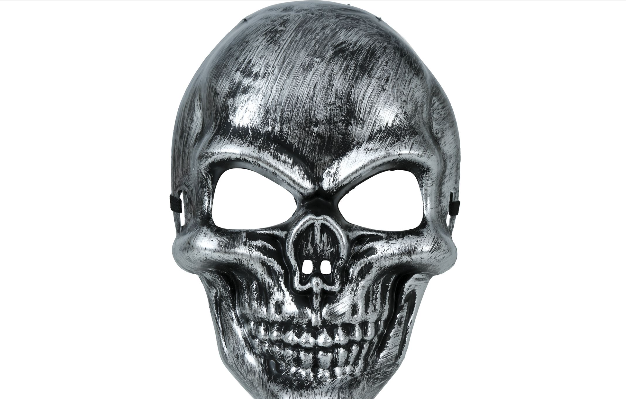 Masque facial en plastique rigide de couleur argent métallique, représentant un crâne squelettique, avec de larges ouvertures pour les yeux.