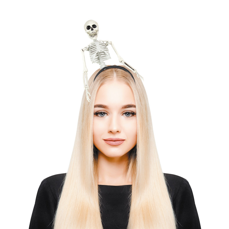Serre-tête squelette d'Halloween. Une décoration amusante et effrayante : un squelette complet qui se pose sur votre tête ! Idéal pour un déguisement rapide ou une blague.