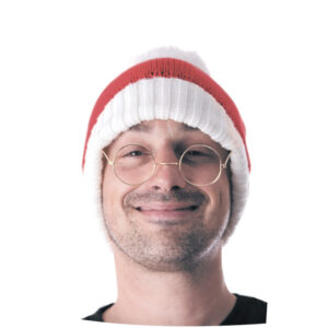 Paire de lunettes rondes avec une monture fine en métal doré et des embouts de branches transparents.