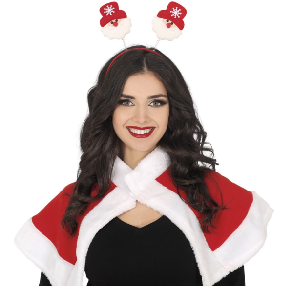 Planche de tatouages éphémères de Noël contenant des motifs du Père Noël, d'elfes, de rennes, de bonhommes de neige et de l'inscription "Merry Christmas".