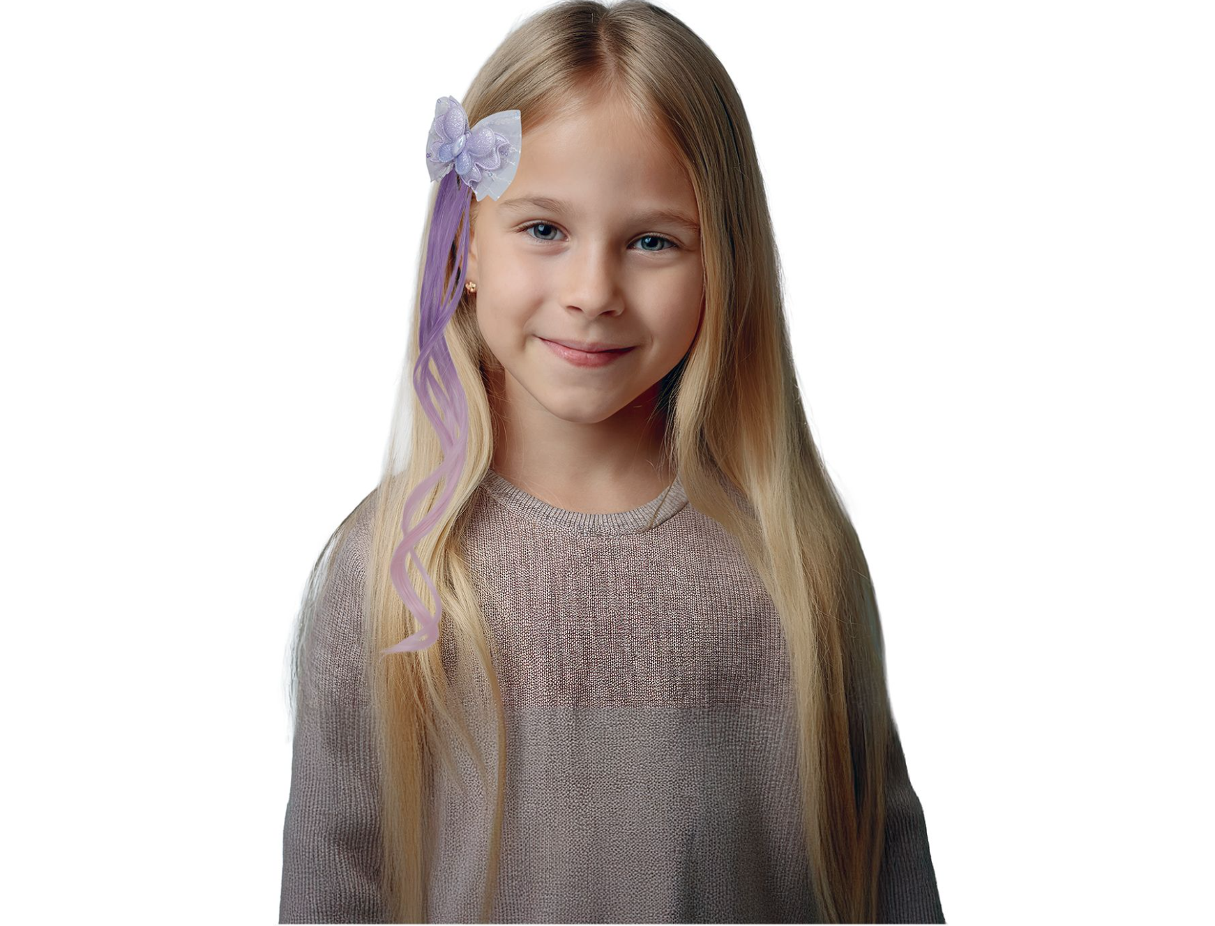 Ajoutez de la magie avec la Mèche Lila à Papillon ! Un dégradé violet/rose et un papillon pailleté sur nœud en tulle. Clip facile pour un look de fée instantané.
