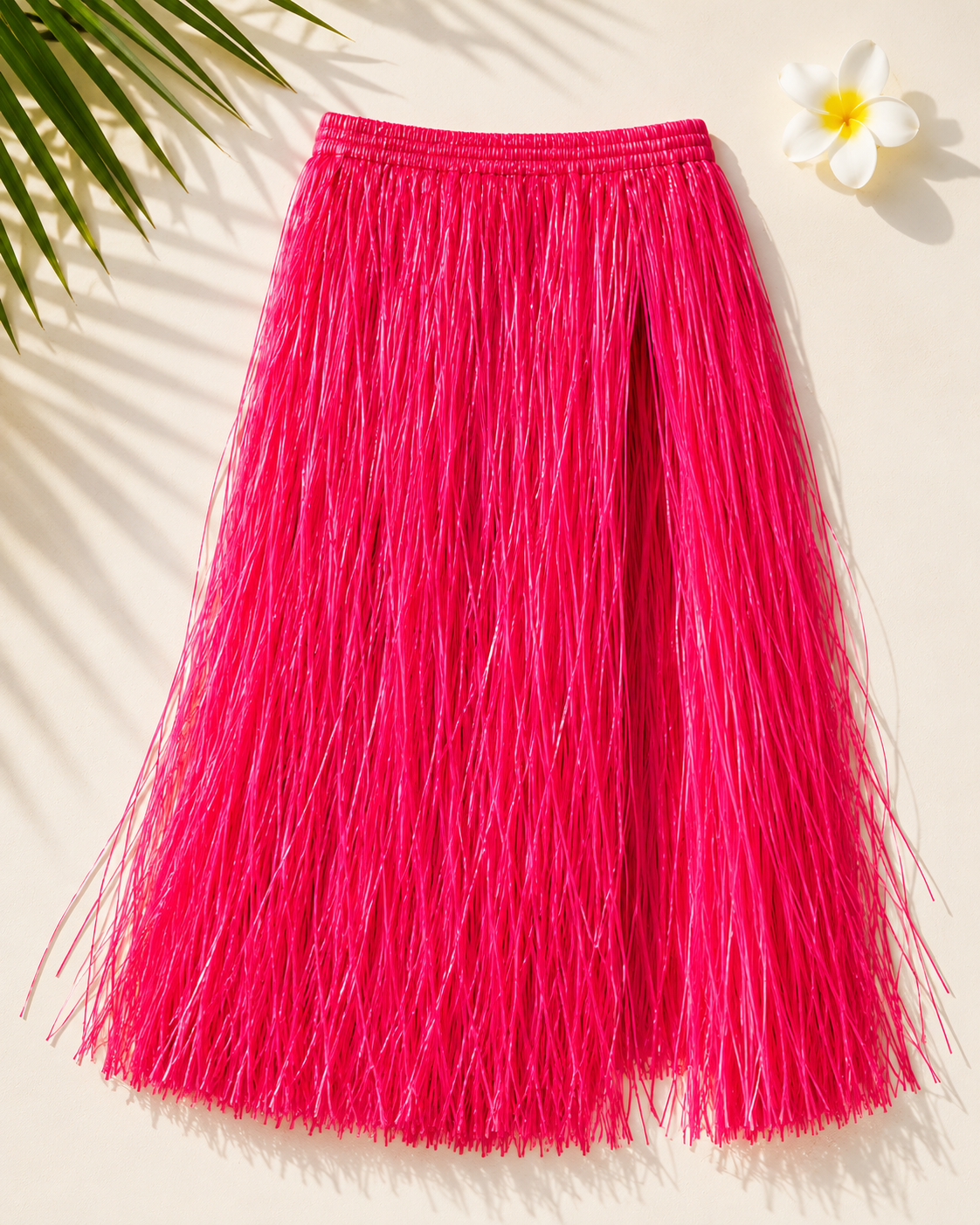 Mettez du peps dans vos soirées tropicales avec notre jupe en raphia rose de 60 cm ! Un accessoire hawaïen fun avec ceinture fleurie intégrée, idéal pour un EVJF ou une pool party.