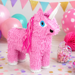 Piñata Licorne rose 39 x 47 x 13 cm à remplir de bonbons et surprises. Idéale pour un anniversaire enfant sur le thème licorne et féérique.