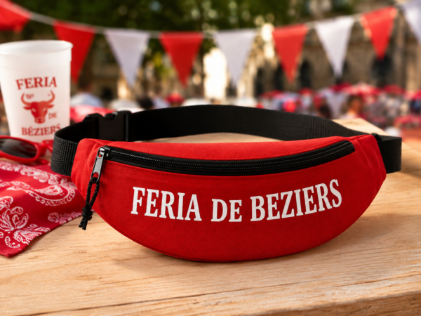 Découvrez la banane rouge Feria de Béziers avec inscription blanche. Pratique et festive, elle complète parfaitement votre tenue rouge et blanche pour la Feria.